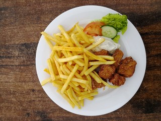 Fish and chips at restaurant, top view
