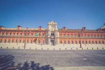 Obraz premium San Telmo palace in Sevilla, Spain. Built in 1682 as the seat of the Seminary School of the University of Navigators. Today houses the Presidency of the Andalusian Autonomous Government