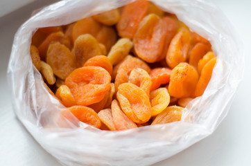 Dried apricots in a plastic bag