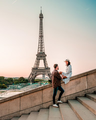 couple men and woman watching sunrise by eiffel tower paris, Eiffel tower Paris, Asian woman and...