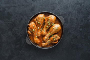 Baked Tandoori Chicken, delicious Indian cuisine. Top view.