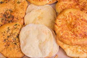 Different types of lavash and khachapuri are on the plate Oriental cuisine