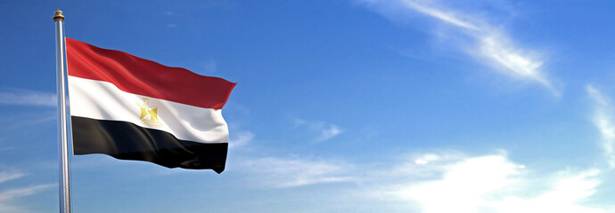 Flag of Egypt rise waving to the wind with sky in the background