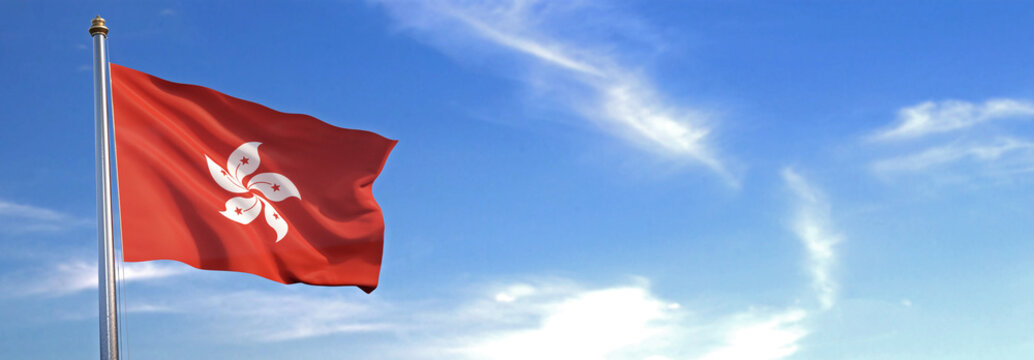 Flag of Hong Kong rise waving to the wind with sky in the background