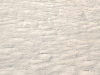 Obraz premium Shadows and patterns on the surface of snow