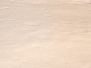 Shadows and patterns on the surface of snow