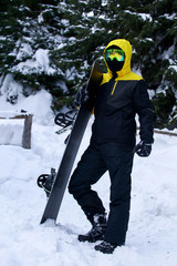 snowboarder in a yellow jacket