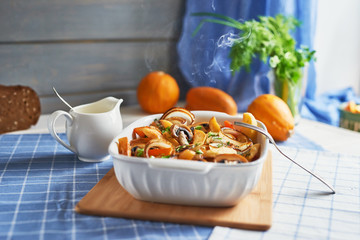 vegetarian roast without meat with pumpkin, potatoes and mushrooms; pumpkin dish