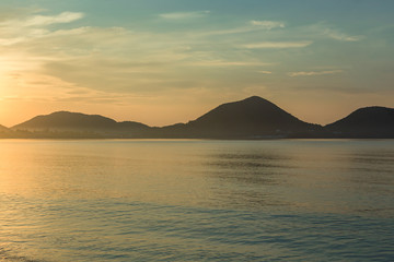 Naklejka na ściany i meble Sunrise on the tropical beach in Thailand coast