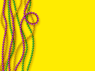 Mardi Gras beads in traditional colors. © ludmila_m