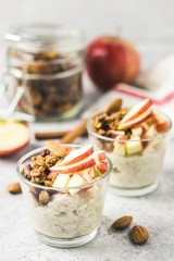 Spiced apple cinnamon overnight oats, healthy breakfast. Selective focus, space for text.