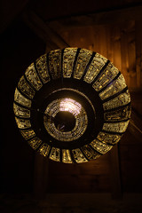 Beautiful moroccan style lamp made of pierced silver metal; country house interiors.