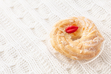 delicious almond cake on white background