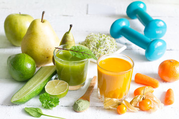Smoothie fresh fruits dumbell  and young sprouts healthy life style food fitness concept