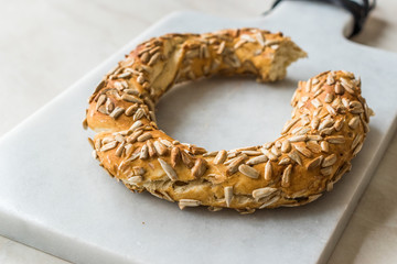 Turkish Bagel Simit with Sunflower / Kernel Seeds on Marble Board.