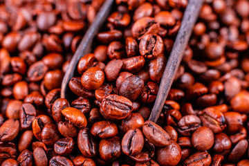 Seeds of fragrant coffee on a dark concrete background. It can be used as a background