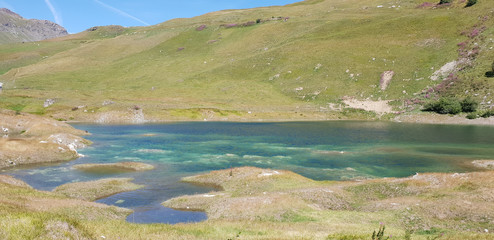 beautiful colored mountain lake with summer light
