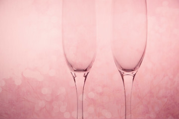 pink couple drinking champagne glasses for dinner invitation on valentine or wedding party background
