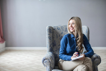 Portrait of professional counselor being ready to take notes.