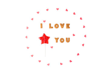 Valentine's day concept. Declaration of love, frame made of paper hearts, lollipop in form star. Flat lay, top view, white background, isolated, copy space