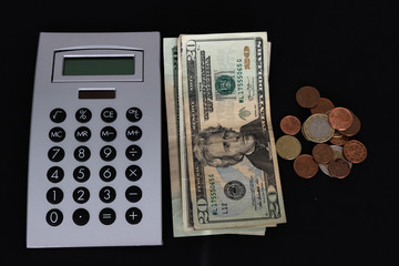 Fototapeta premium Money and Calculator, business concept. American dollars counting cash.