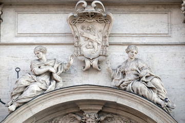 Fototapeta premium Coat of arms of Cardinal Francesco Peretti on the portal of Sant Andrea della Valle Church in Rome, Italy 