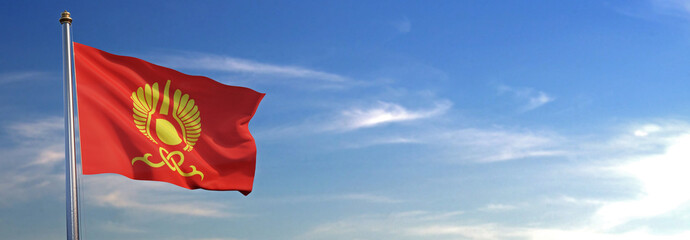 Flag of Kyzyl rise waving to the wind with sky in the background