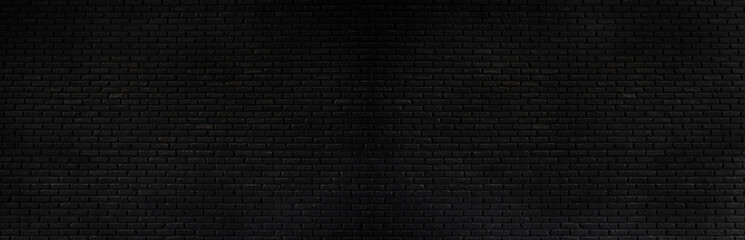 panorama  black brick wall texture, brick surface background. Vintage floor wallpaper.