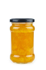 Glass jar with peach jam on white background