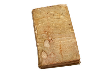 Book. Ancient vintage book, shabby and old on a white background. Archaeological find. Ancient knowledge. An old book from the library. Artifact. The subject is isolated. Place for text.