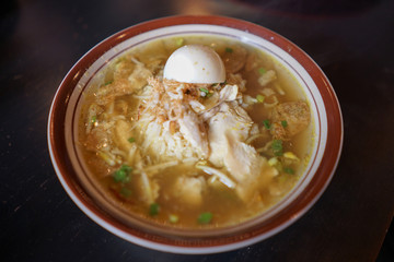 Chicken Soto, traditional Indonesian meat soup with many seasoning