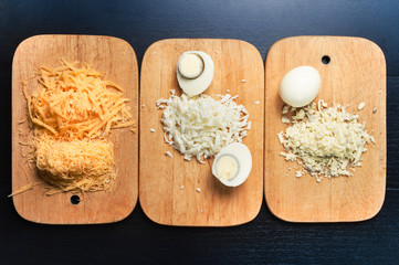 Obraz na płótnie Canvas cutting board with egg and cheese