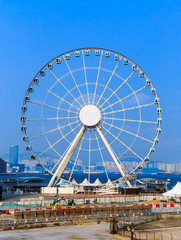 HONG KONG, CHINA -   SEP 12, 2015 : The Hong Kong Observation Wheel,The area around the wheel includes a plaza for events as well as drinks and snacks and free Wi-Fi.