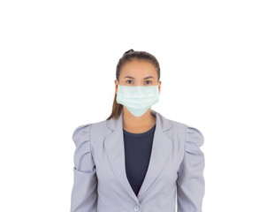 Wearing a dust mask.