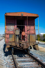 Fototapeta na wymiar Abadnoned caboose on a railroad siding in North Carolina, USA