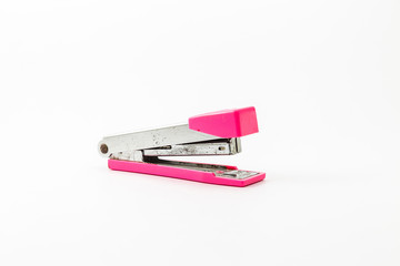 pink stapler isolated on white background, with a clipping path