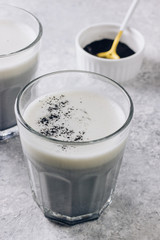 Black charcoal latte. Detox drink. Selective focus