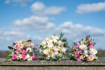 Wedding bouquet flowers isolated on wall