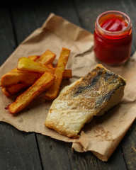 Fish and Fries (white fish with salmon, portion). food background. copy space