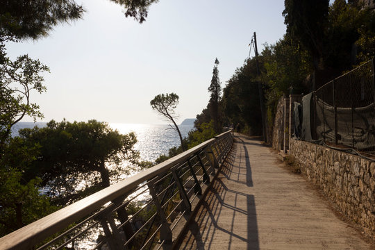 LAPAD, CROATIA - AUGUST 23 2017: Promenade in Lapad, facing the sea