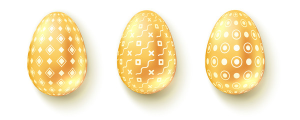 Fototapeta na wymiar Realistic three-dimensional Easter eggs isolated on white background. Set of icons of glossy golden eggs with pattern. Decorative design elements, 3d vector illustration