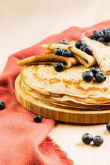 Fresh homemade crepes with blueberry and honey