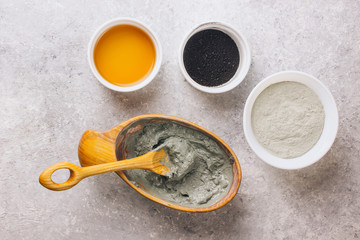 facial mask by activated charcoals powder clay and vinegar