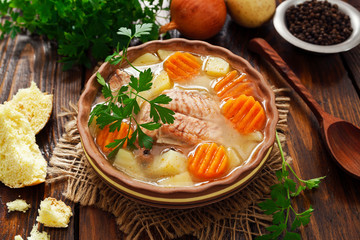 Salmon soup with vegetables