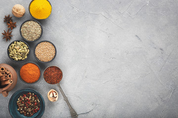 Obraz na płótnie Canvas Wooden table of colorful spices.