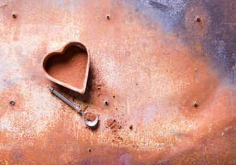 Heart on a rusty metal background.