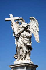 Statue of Angel with the Cross by Ercole Ferrata, Ponte Sant Angelo in Rome, Italy  