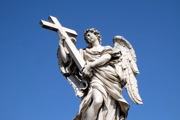 Statue of Angel with the Cross by Ercole Ferrata, Ponte Sant Angelo in Rome, Italy  