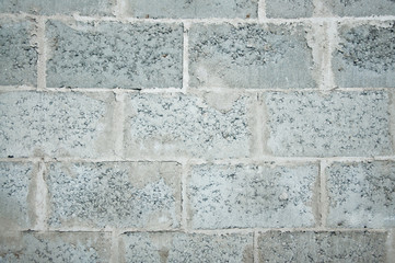 Obraz premium Fragment of background construction site. Part of the masonry wall at a construction site.