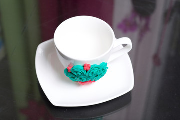 Mug, decorated with flowers made of polymer clay. Crafts from polymer clay. Mug decorated with...
